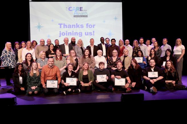 Colleagues on stage at our awards ceremony